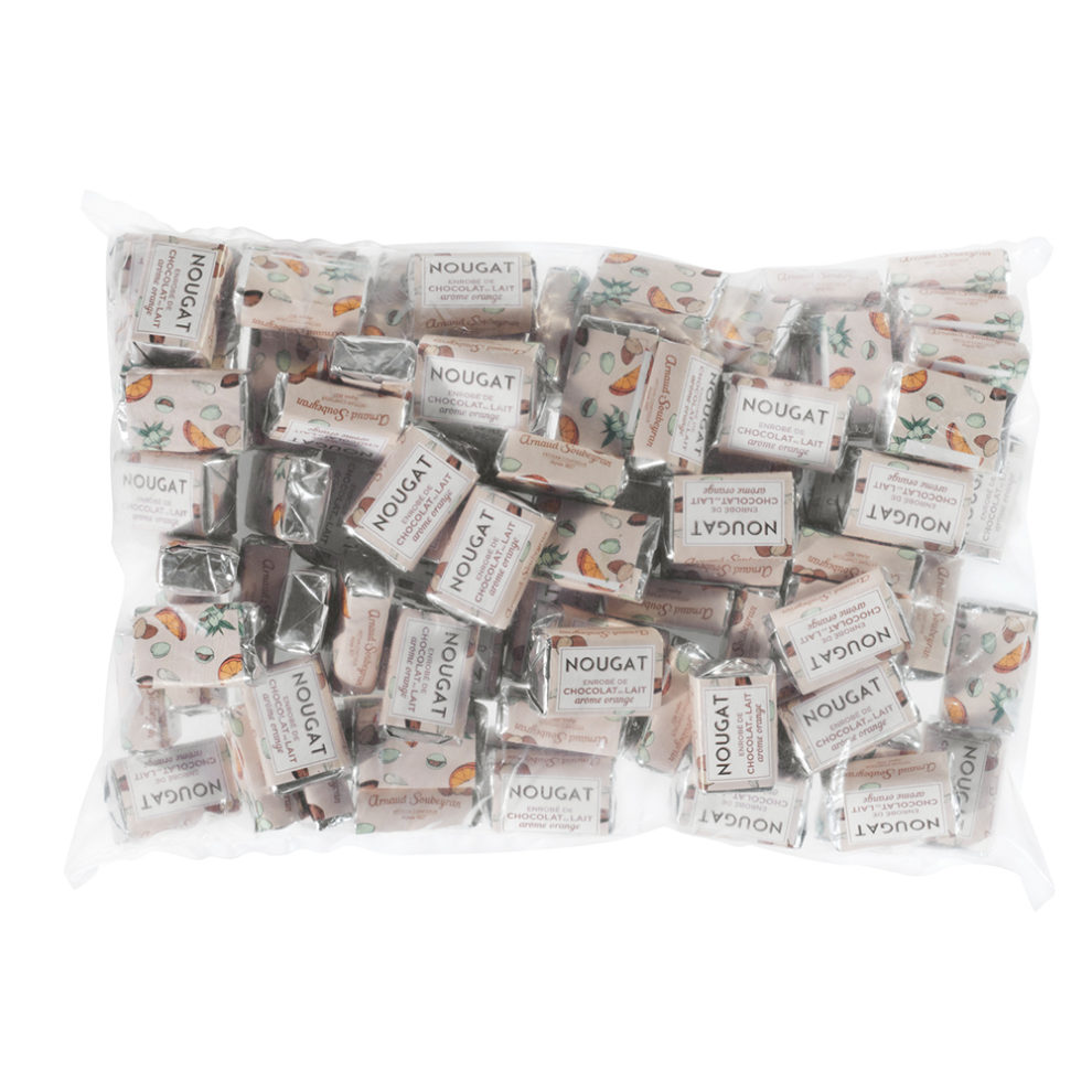 Nougat coated with milk chocolate & orange peel - 1kg bulk domino